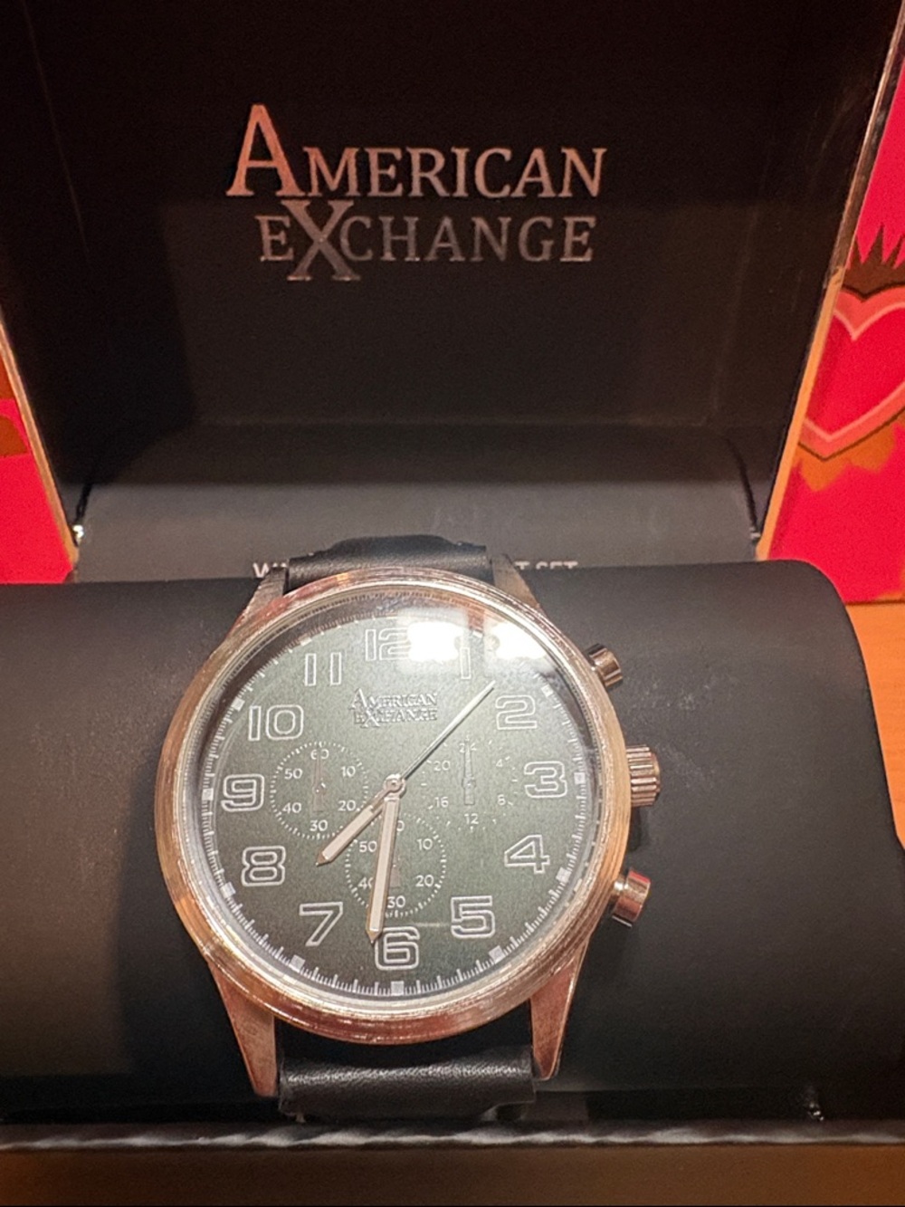American Exchange Black Dial Watch with Silver Case